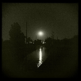 Recovered image from Full moon over the canal